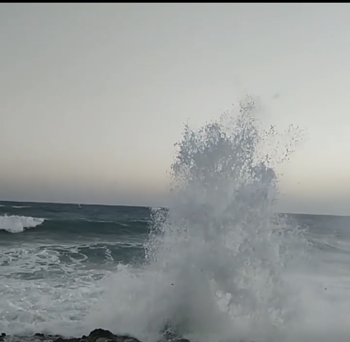 The Grand Cayman Blow Holes erupting at full force, East End coastline