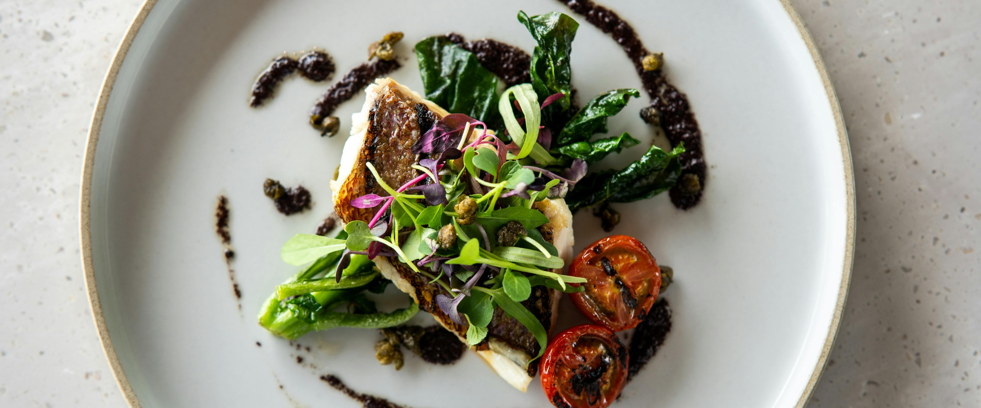 Elegantly plated dish at Bàcaro Grand Cayman