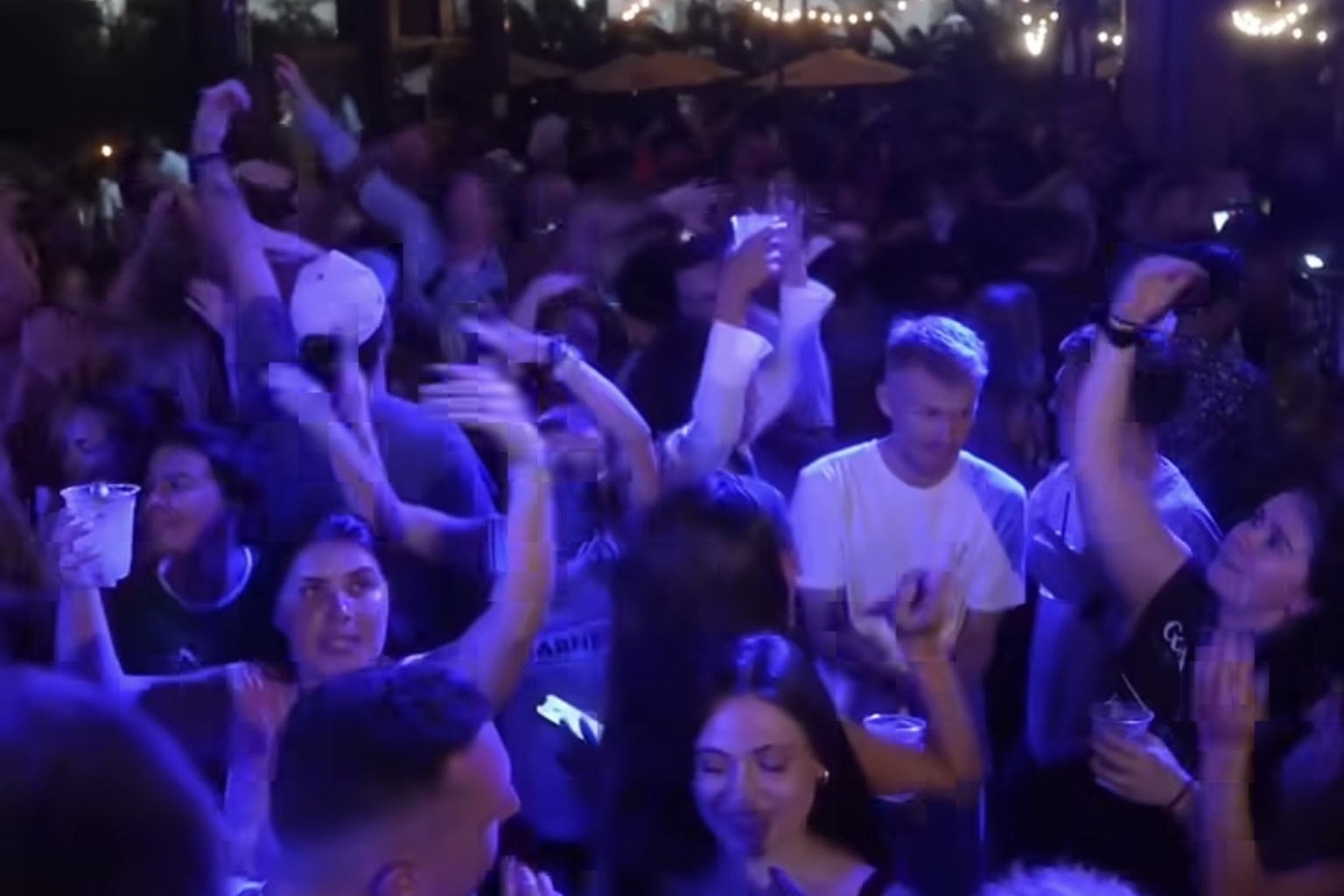 Crowd dancing at The Hive nightlife venue Grand Cayman